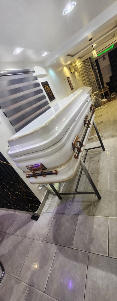 Pearl White Casket — Showroom View